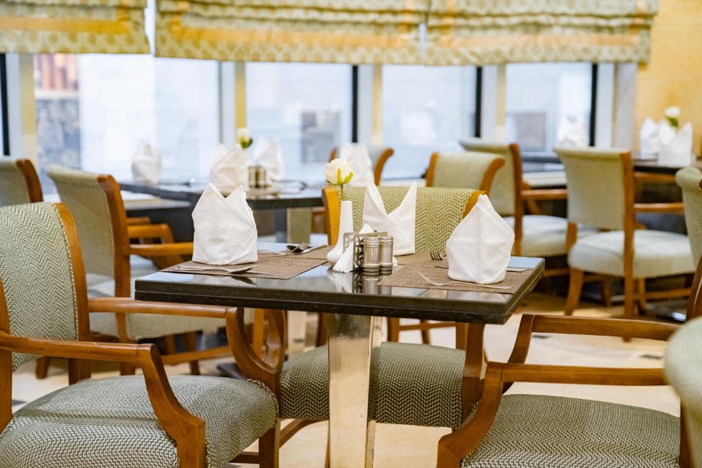 Emaar Grand Hotel Mecca - Luxury room interior with Haram view, premium Umrah accommodation facilities and amenities